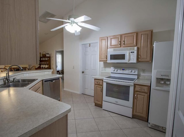kitchen featuring white appliances, a sink, light tile patterned floors, high vaulted ceiling, and a ceiling fan