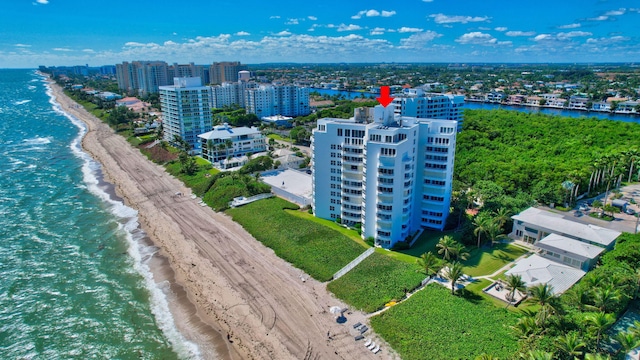 bird's eye view of waterfront with a beach