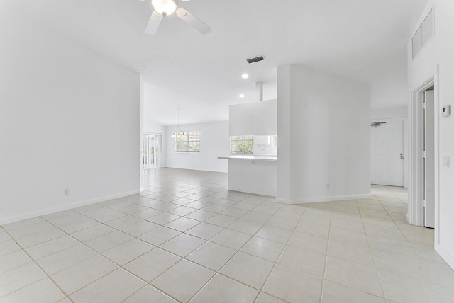 unfurnished room with light tile patterned flooring, a ceiling fan, recessed lighting, and baseboards