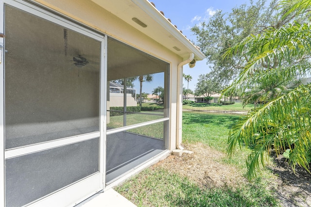 7720 Pine Island Way, West Palm Beach, FL 33411 - view of grassy yard with a sunroom