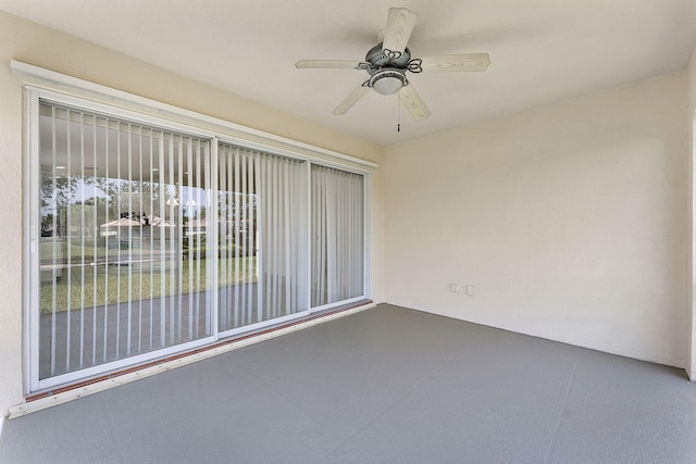unfurnished room with ceiling fan