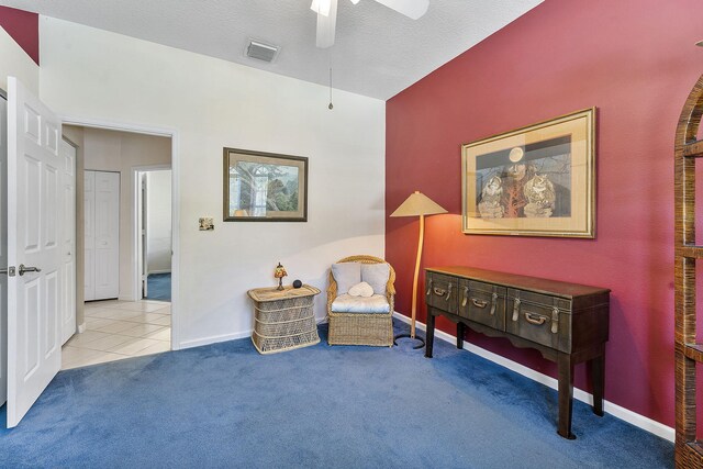 4911 Tropical Garden Dr, Boynton Beach, FL 33436 - sitting room featuring ceiling fan, carpet floors, and tile patterned flooring