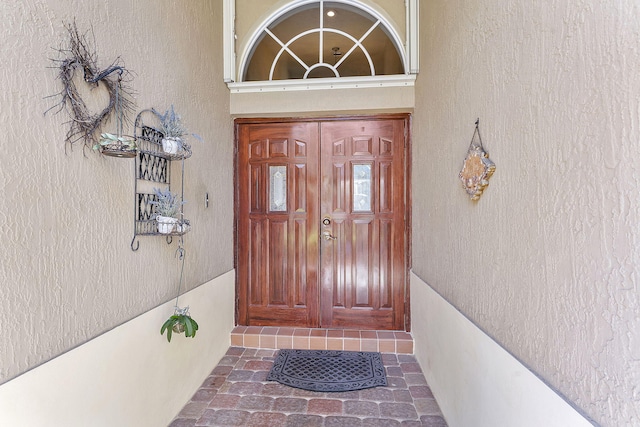 4911 Tropical Garden Dr, Boynton Beach, FL 33436 - view of exterior entry with stucco siding