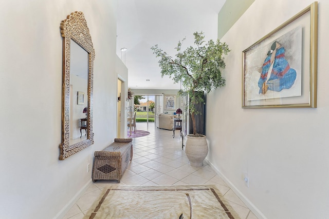 4911 Tropical Garden Dr, Boynton Beach, FL 33436 - corridor with light tile patterned flooring and baseboards