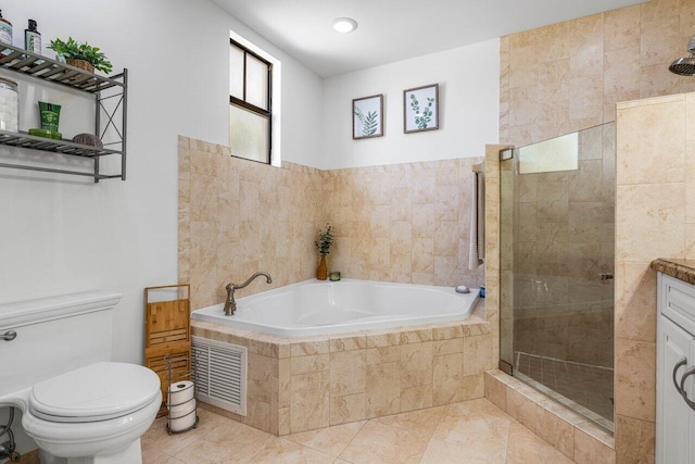 507 SW 17th St, Fort Lauderdale, FL 33315 - bathroom with a tile shower, a garden tub, toilet, and tile patterned flooring