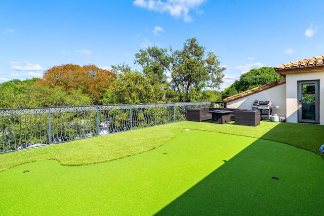 507 SW 17th St, Fort Lauderdale, FL 33315 - view of home's community featuring a putting area and an outdoor hangout area