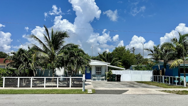 1119 S Ridge St, Lake Worth, FL 33460 - view of front of home featuring a fenced front yard and concrete driveway
