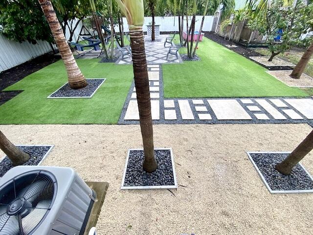 1119 S Ridge St, Lake Worth, FL 33460 - view of yard with a patio area and central AC