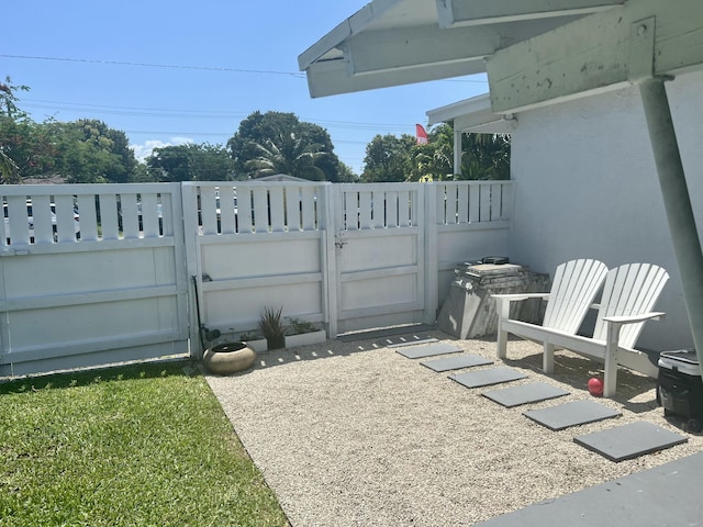 1119 S Ridge St, Lake Worth, FL 33460 - view of patio / terrace featuring a gate