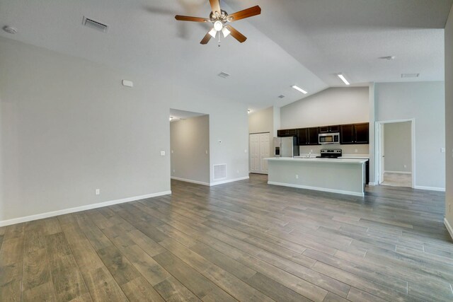 unfurnished living room featuring high vaulted ceiling, a ceiling fan, wood finished floors, and baseboards