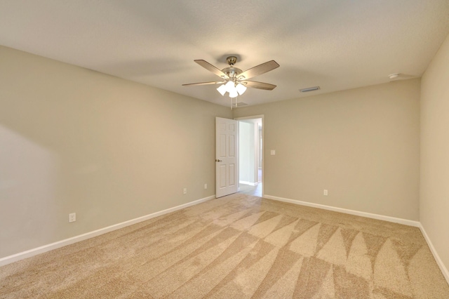 5800 NW Whitecap Rd, Port Saint Lucie, FL 34986 - spare room with ceiling fan, light carpet, and baseboards
