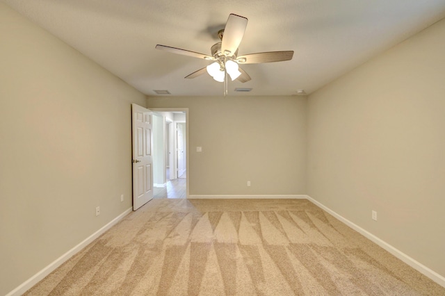 5800 NW Whitecap Rd, Port Saint Lucie, FL 34986 - unfurnished room with light carpet, ceiling fan, and baseboards