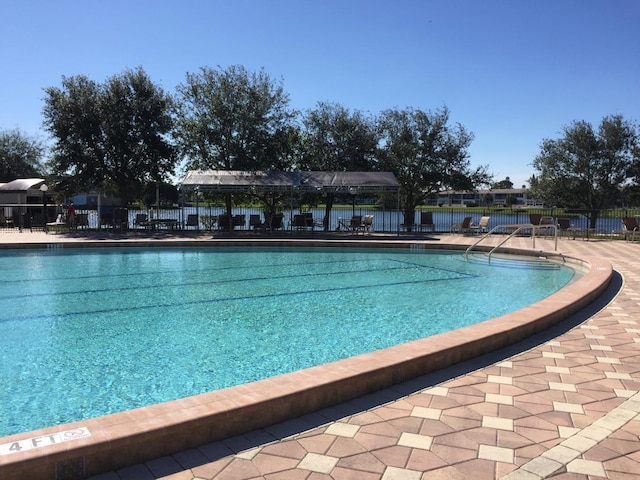 community pool with fence