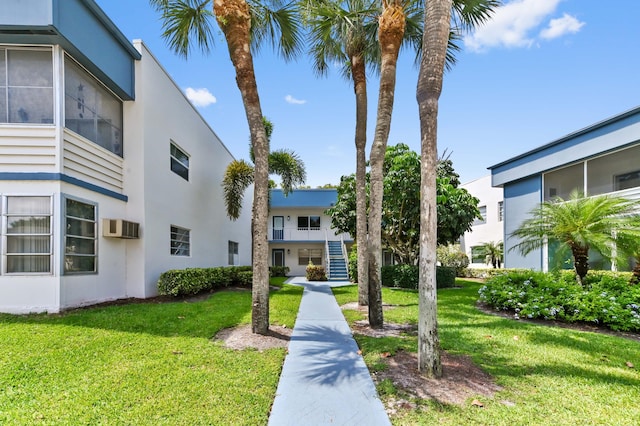 278 Normandy F, Delray Beach, FL 33484 - view of community featuring a yard