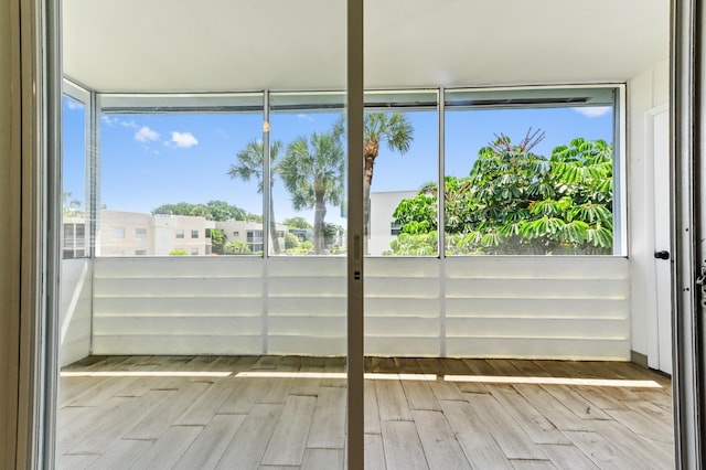 278 Normandy F, Delray Beach, FL 33484 - unfurnished sunroom with healthy amount of natural light