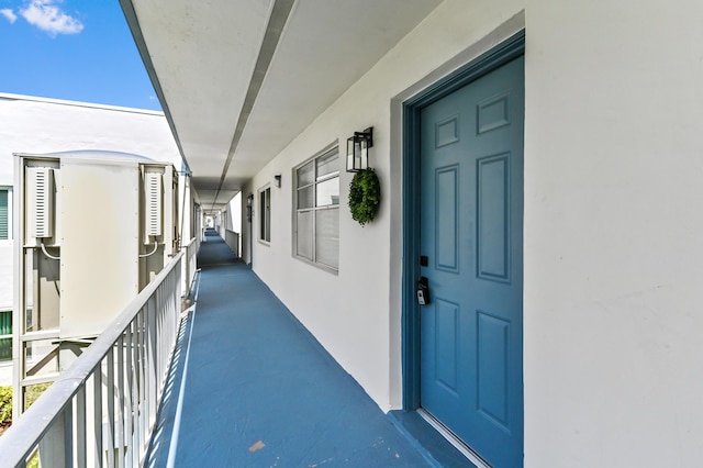 278 Normandy F, Delray Beach, FL 33484 - view of exterior entry with stucco siding