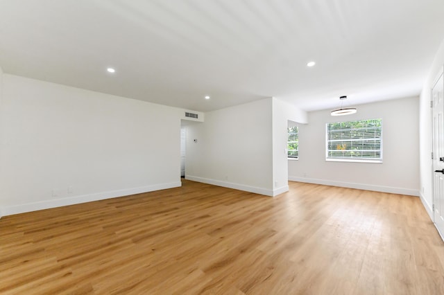 278 Normandy F, Delray Beach, FL 33484 - unfurnished room featuring light wood-style flooring, recessed lighting, and baseboards