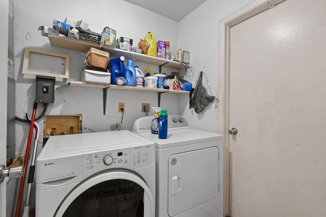 1402 SE Buckingham Ter, Port Saint Lucie, FL 34952 - laundry area with washer and clothes dryer