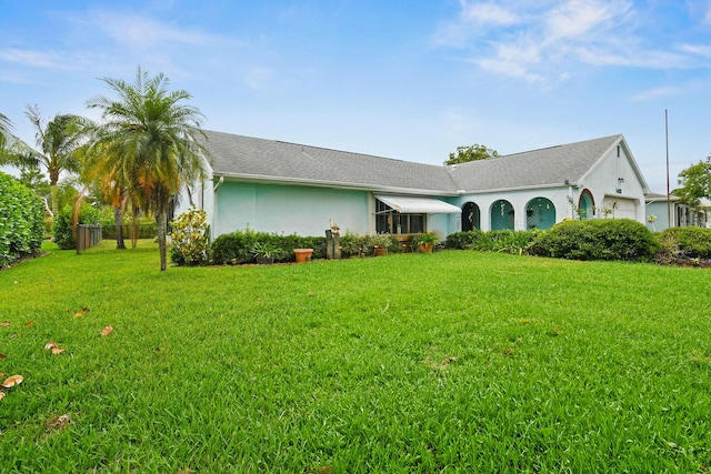 1402 SE Buckingham Ter, Port Saint Lucie, FL 34952 - view of front of property featuring an attached garage and stucco siding