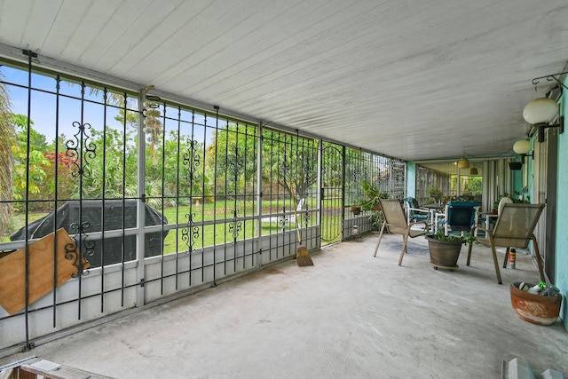 1402 SE Buckingham Ter, Port Saint Lucie, FL 34952 - sunroom / solarium featuring outdoor dining area