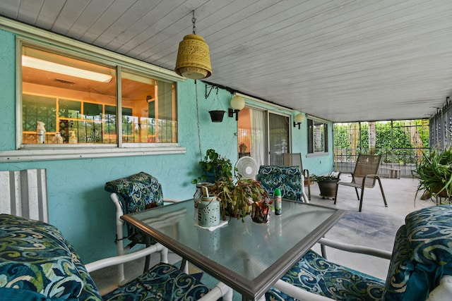 1402 SE Buckingham Ter, Port Saint Lucie, FL 34952 - view of patio with covered porch and outdoor dining area