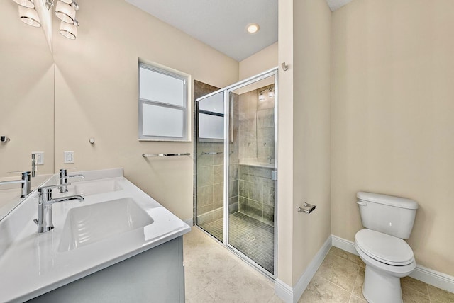 full bath with toilet, baseboards, a stall shower, tile patterned flooring, and double vanity