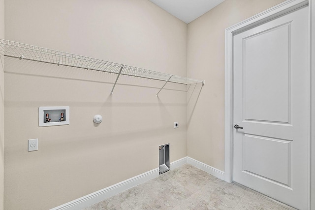washroom featuring washer hookup, hookup for an electric dryer, baseboards, and gas dryer hookup