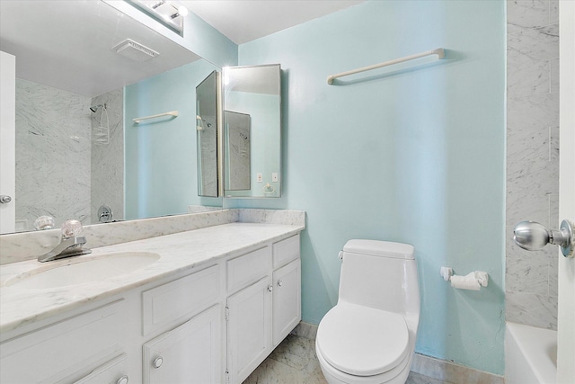 full bathroom featuring marble look tile flooring, toilet, and vanity