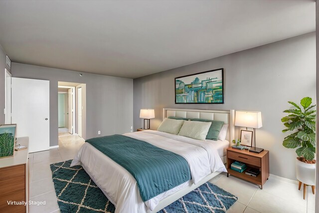 tiled bedroom with baseboards