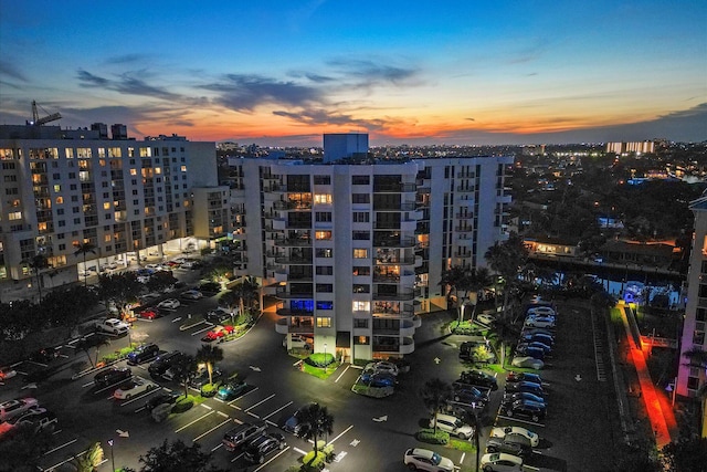 property at dusk with a view of city