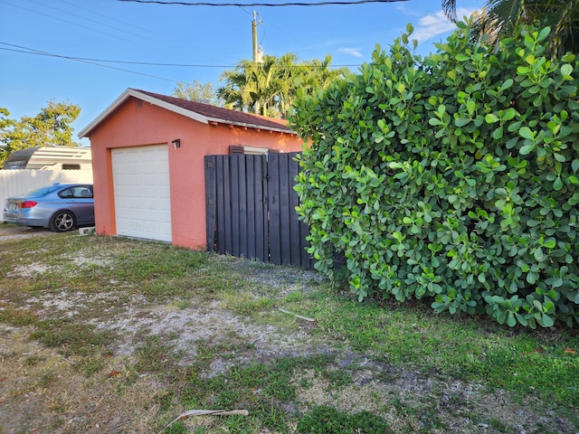 832 N D St, Lake Worth Beach, FL 33460 - detached garage featuring fence