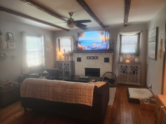 832 N D St, Lake Worth Beach, FL 33460 - living room featuring dark wood-style flooring, beam ceiling, ceiling fan, and a brick fireplace