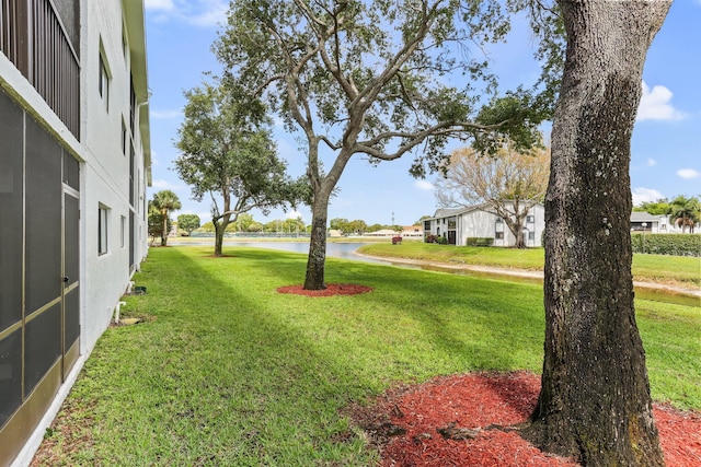 15365 Lakes Of Delray Blvd Unit 106, Delray Beach, FL 33484 - view of grassy yard featuring a water view