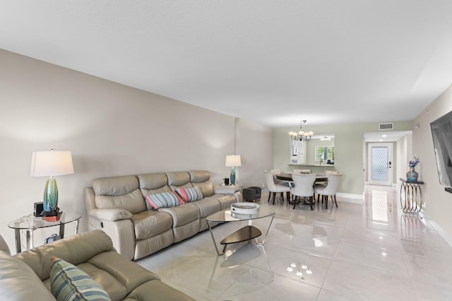 15365 Lakes Of Delray Blvd Unit 106, Delray Beach, FL 33484 - living area with a chandelier