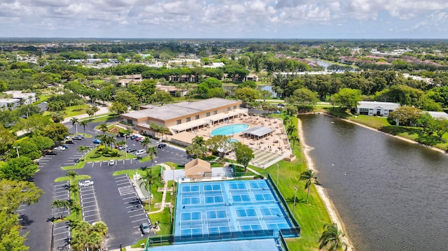 15365 Lakes Of Delray Blvd Unit 106, Delray Beach, FL 33484 - drone / aerial view of a large body of water, a pool area, and a tree filled landscape
