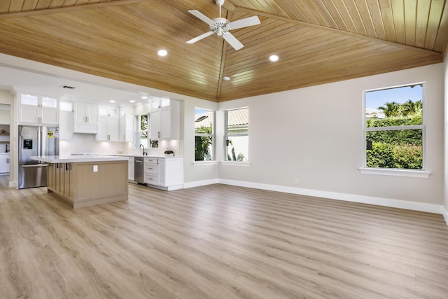 3333 Southern Cay Dr, Jupiter, FL 33477 - unfurnished living room with wood ceiling, baseboards, a ceiling fan, light wood-type flooring, and recessed lighting