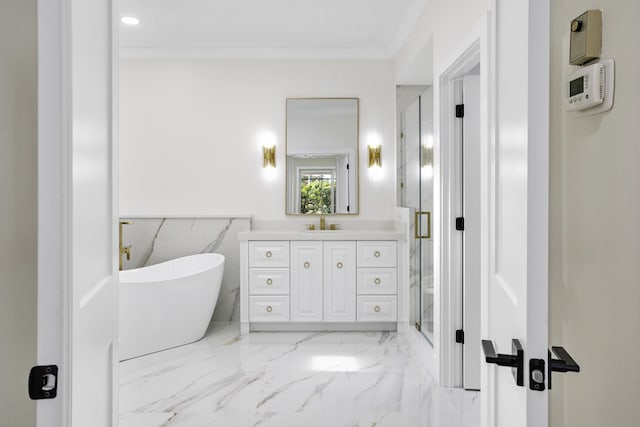 3333 Southern Cay Dr, Jupiter, FL 33477 - bathroom featuring vanity, a shower stall, marble tiled flooring, a soaking tub, and ornamental molding