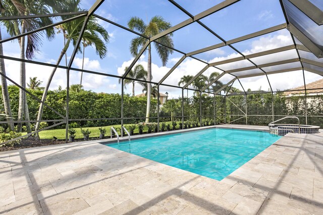 3333 Southern Cay Dr, Jupiter, FL 33477 - view of swimming pool featuring a pool with connected hot tub and a patio