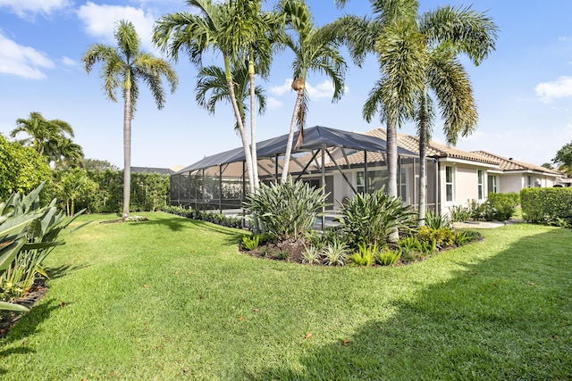 3333 Southern Cay Dr, Jupiter, FL 33477 - view of grassy yard with a lanai
