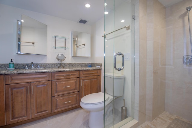 3230 S Ocean Blvd Unit D511, Palm Beach, FL 33480 - bathroom featuring toilet, a shower stall, vanity, and recessed lighting