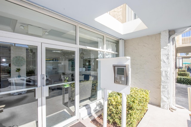 3230 S Ocean Blvd Unit D511, Palm Beach, FL 33480 - view of exterior entry featuring stucco siding