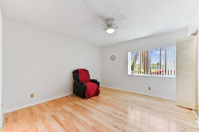 302 Knotty Pine Cir Unit D-1, Greenacres, FL 33463 - unfurnished room featuring a ceiling fan, wood finished floors, and baseboards