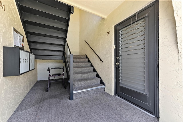 302 Knotty Pine Cir Unit D-1, Greenacres, FL 33463 - stairs with a textured wall and carpet floors