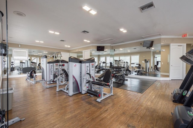 166 SW Peacock Blvd Unit 34-205, Port Saint Lucie, FL 34986 - workout area with crown molding, wood finished floors, and recessed lighting