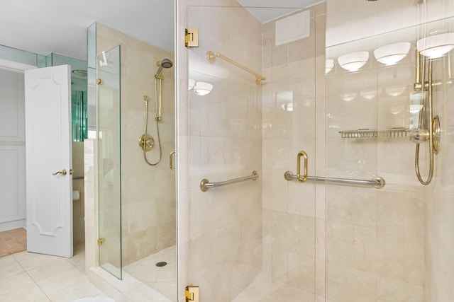 250 Bradley Pl Unit 408, Palm Beach, FL 33480 - bathroom with a shower stall and tile patterned flooring