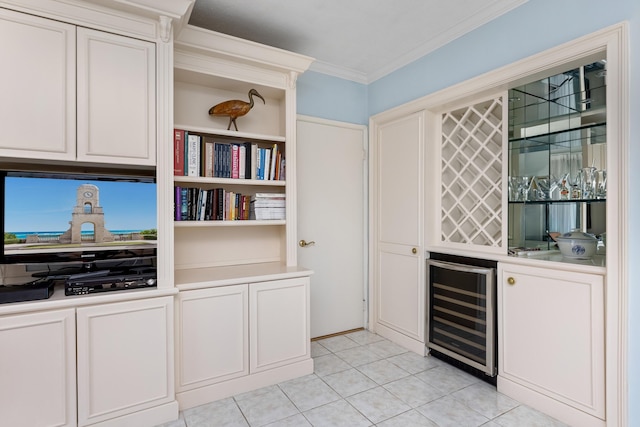 250 Bradley Pl Unit 408, Palm Beach, FL 33480 - indoor dry bar featuring beverage cooler, light tile patterned floors, and crown molding