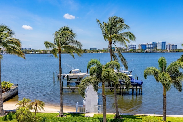 250 Bradley Pl Unit 408, Palm Beach, FL 33480 - dock featuring boat lift and a water view