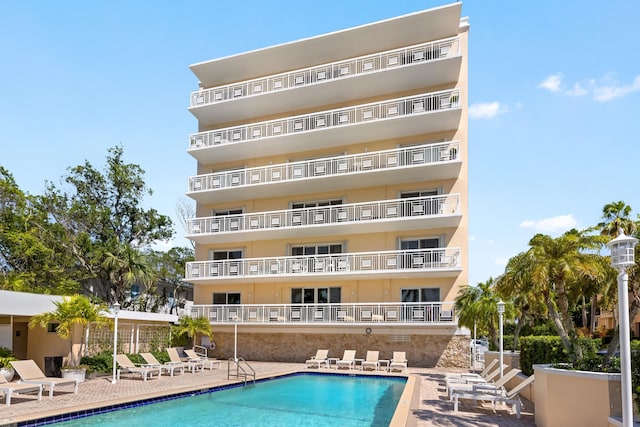 250 Bradley Pl Unit 408, Palm Beach, FL 33480 - community pool featuring a patio area