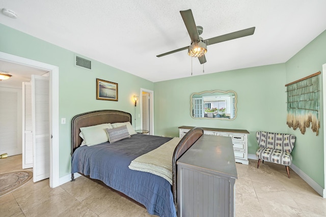711 NE Harbour Ter Unit 4120, Boca Raton, FL 33431 - bedroom featuring baseboards, ceiling fan, and light tile patterned floors