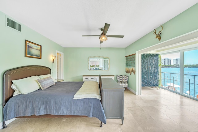 711 NE Harbour Ter Unit 4120, Boca Raton, FL 33431 - bedroom featuring multiple windows, ceiling fan, access to exterior, and light tile patterned floors